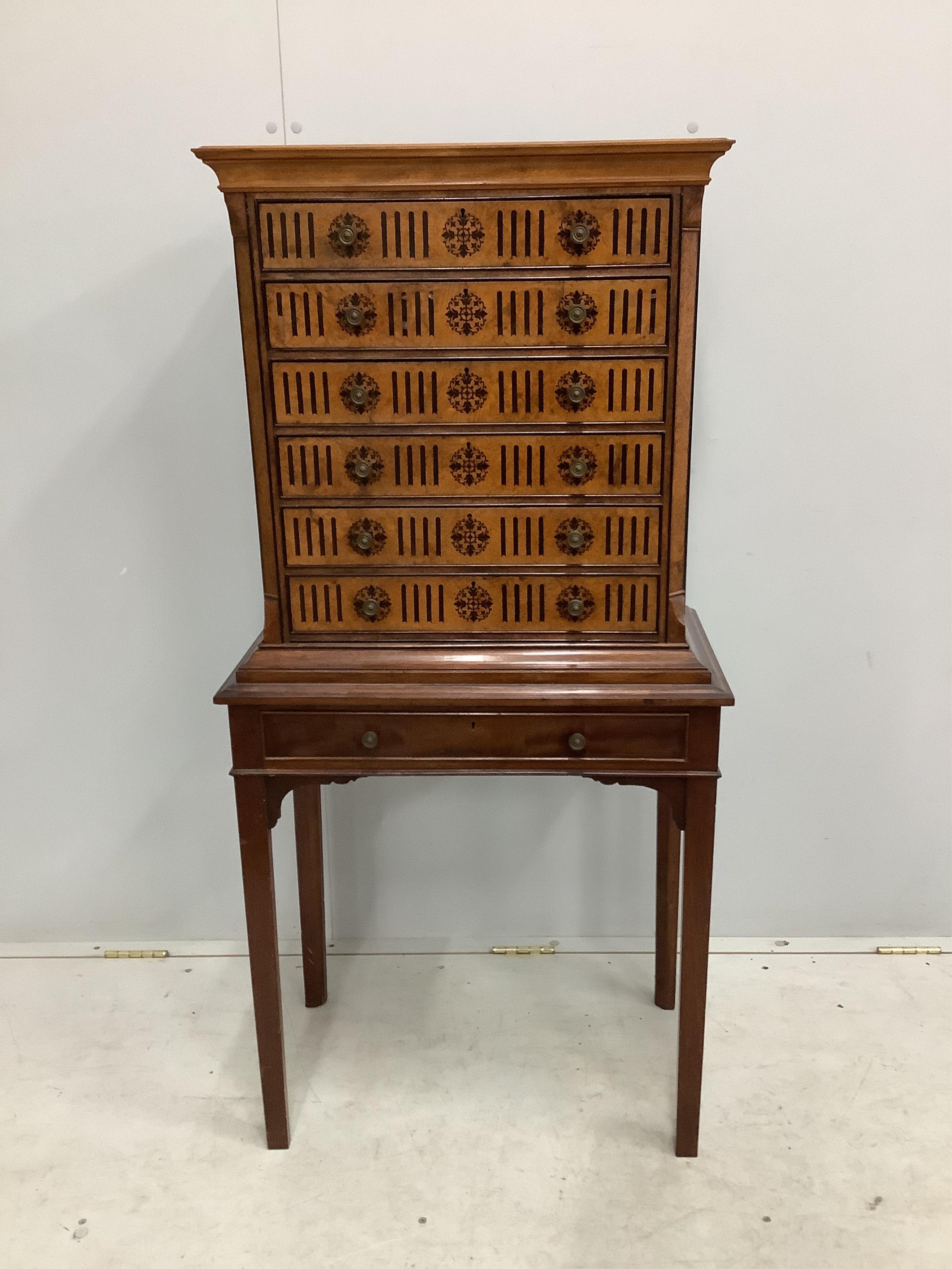 A late Victorian ebony inlaid bird's eye maple and mahogany collector’s chest on later stand, width 62cm, depth 36cm, height 128cm. Condition - fair to good